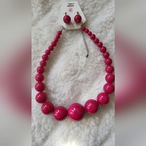 Hot Pink graduated bead necklace with matching dangle earrings.